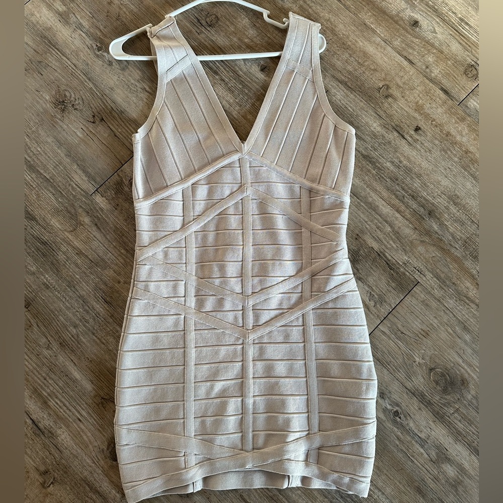 Beige Sleeveless Bandage Dress - Chic and Flattering!